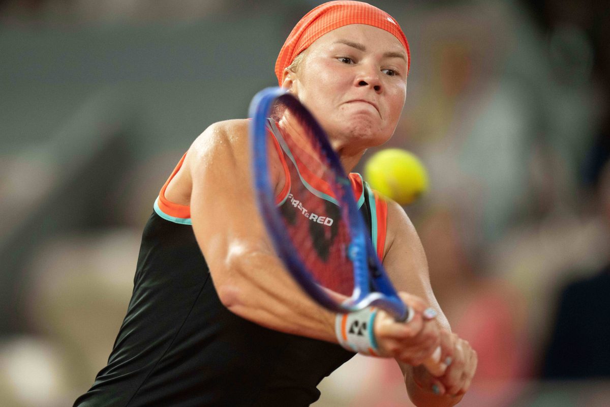 Jun 4, 2026; Paris, France;  Diana Shnaider returns a shot during her match against Maja Chwalinska of Poland on day 12 at Stade Roland Garros. Mandatory Credit: Susan Mullane-Imagn Images