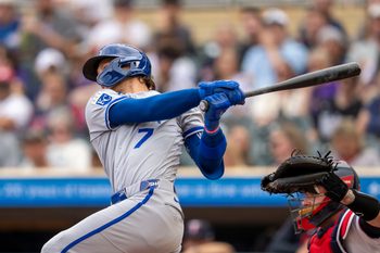 Jun 4, 2026; Minneapolis, Minnesota, USA; Kansas City Royals shortstop Bobby Witt Jr. (7) hits a single against the Minnesota Twins in the first inning at Target Field. Mandatory Credit: Jesse Johnson-Imagn Images