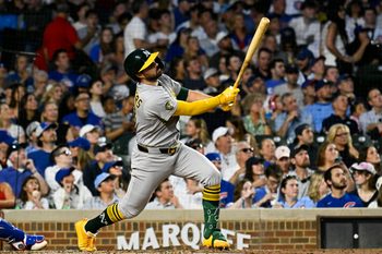 Jun 4, 2026; Chicago, Illinois, USA; Oakland Athletics catcher Shea Langeliers (23) hits a two run inside the park home run against the Chicago Cubs during the sixth inning at Wrigley Field. Mandatory Credit: Matt Marton-Imagn Images