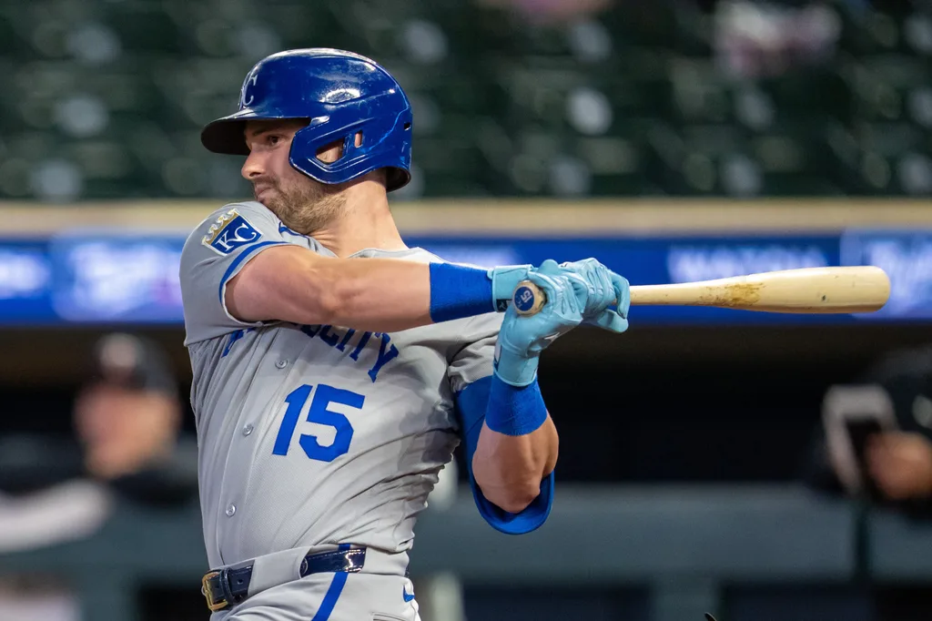 Jun 4, 2026; Minneapolis, Minnesota, USA; Kansas City Royals center fielder Lane Thomas (15) hits a single against the Minnesota Twins in the ninth inning at Target Field. Mandatory Credit: Jesse Johnson-Imagn Images