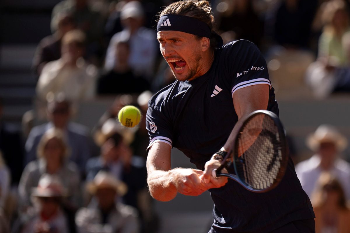 Jun 5, 2026; Paris, France;  Alexander Zverev of Germany returns a shot during his match against Jakub Mensik of Czechia on day 12 at Stade Roland Garros. Mandatory Credit: Susan Mullane-Imagn Images