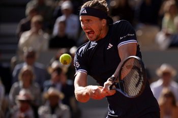 Jun 5, 2026; Paris, France;  Alexander Zverev of Germany returns a shot during his match against Jakub Mensik of Czechia on day 12 at Stade Roland Garros. Mandatory Credit: Susan Mullane-Imagn Images