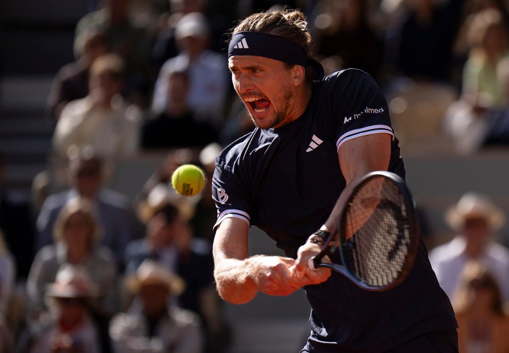 Jun 5, 2026; Paris, France; Alexander Zverev of Germany returns a shot during his match against Jakub Mensik of Czechia on day 12 at Stade Roland Garros. Mandatory Credit: Susan Mullane-Imagn Images