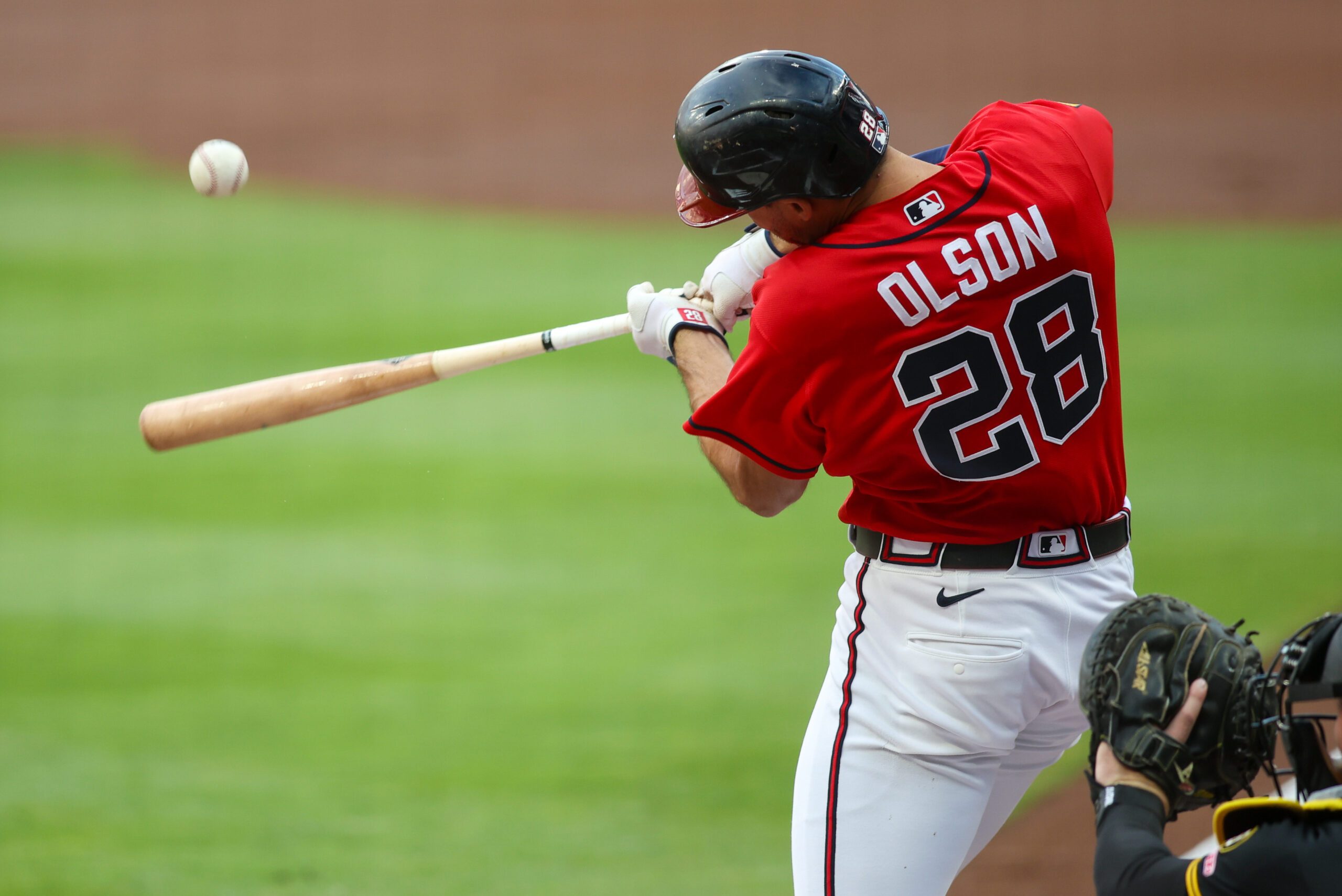 Jun 5, 2026; Atlanta, Georgia, USA; Atlanta Braves first baseman Matt Olson (28) hits a single against the Pittsburgh Pirates in the first inning at Truist Park. Mandatory Credit: Brett Davis-Imagn Images