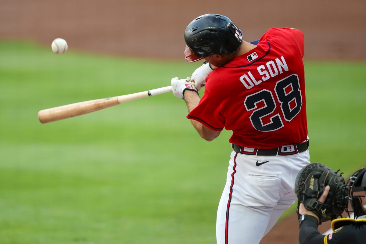 Jun 5, 2026; Atlanta, Georgia, USA; Atlanta Braves first baseman Matt Olson (28) hits a single against the Pittsburgh Pirates in the first inning at Truist Park. Mandatory Credit: Brett Davis-Imagn Images