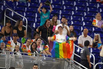 Jun 5, 2026; Miami, Florida, USA;  Fans hold up a Pride Flag and cheer on MLB Pride Night between the Tampa Bay Rays  against the Miami Marlins during the fourth inning at loanDepot Park. Mandatory Credit: Rhona Wise-Imagn Images