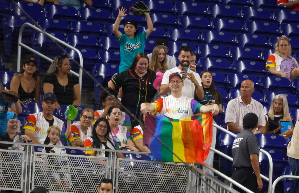 Jun 5, 2026; Miami, Florida, USA; Fans hold up a Pride Flag and cheer on MLB Pride Night between the Tampa Bay Rays against the Miami Marlins during the fourth inning at loanDepot Park. Mandatory Credit: Rhona Wise-Imagn Images