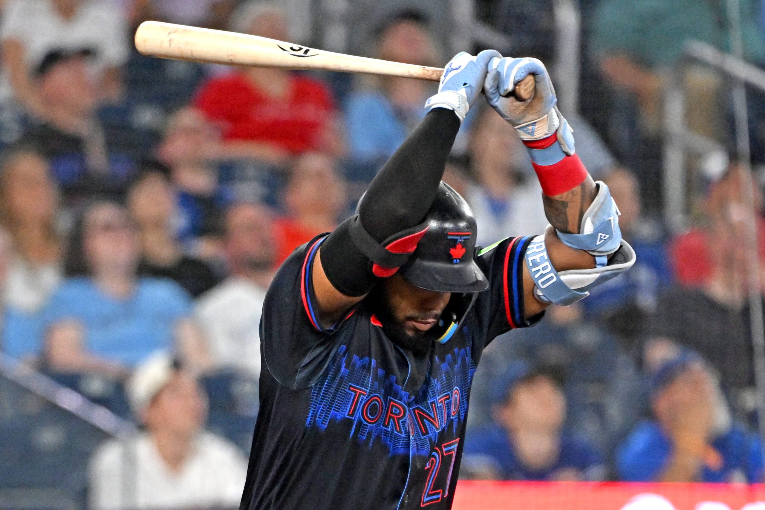 Jun 5, 2026; Toronto, Ontario, CAN;  Toronto Blue Jays first baseman Vladimir Guerrero Jr. (27) reacts after popping out against the Baltimore Orioles in the eighth inning at Rogers Centre. Mandatory Credit: Dan Hamilton-Imagn Images