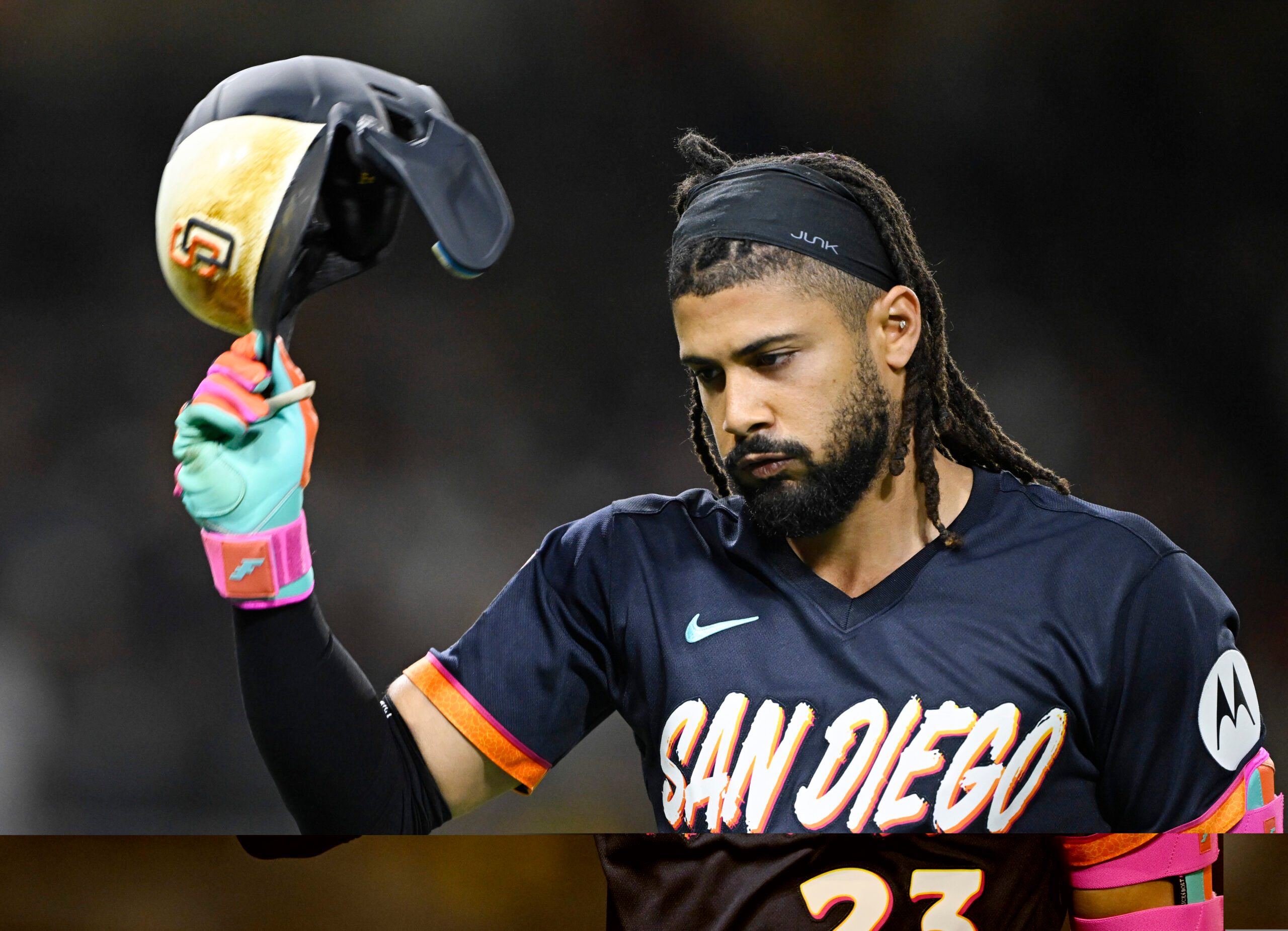 Jun 5, 2026; San Diego, California, USA; San Diego Padres right fielder Fernando Tatis Jr. (23) throws his helmet after lining out during the eighth inning against the New York Mets at Petco Park. Mandatory Credit: Denis Poroy-Imagn Images