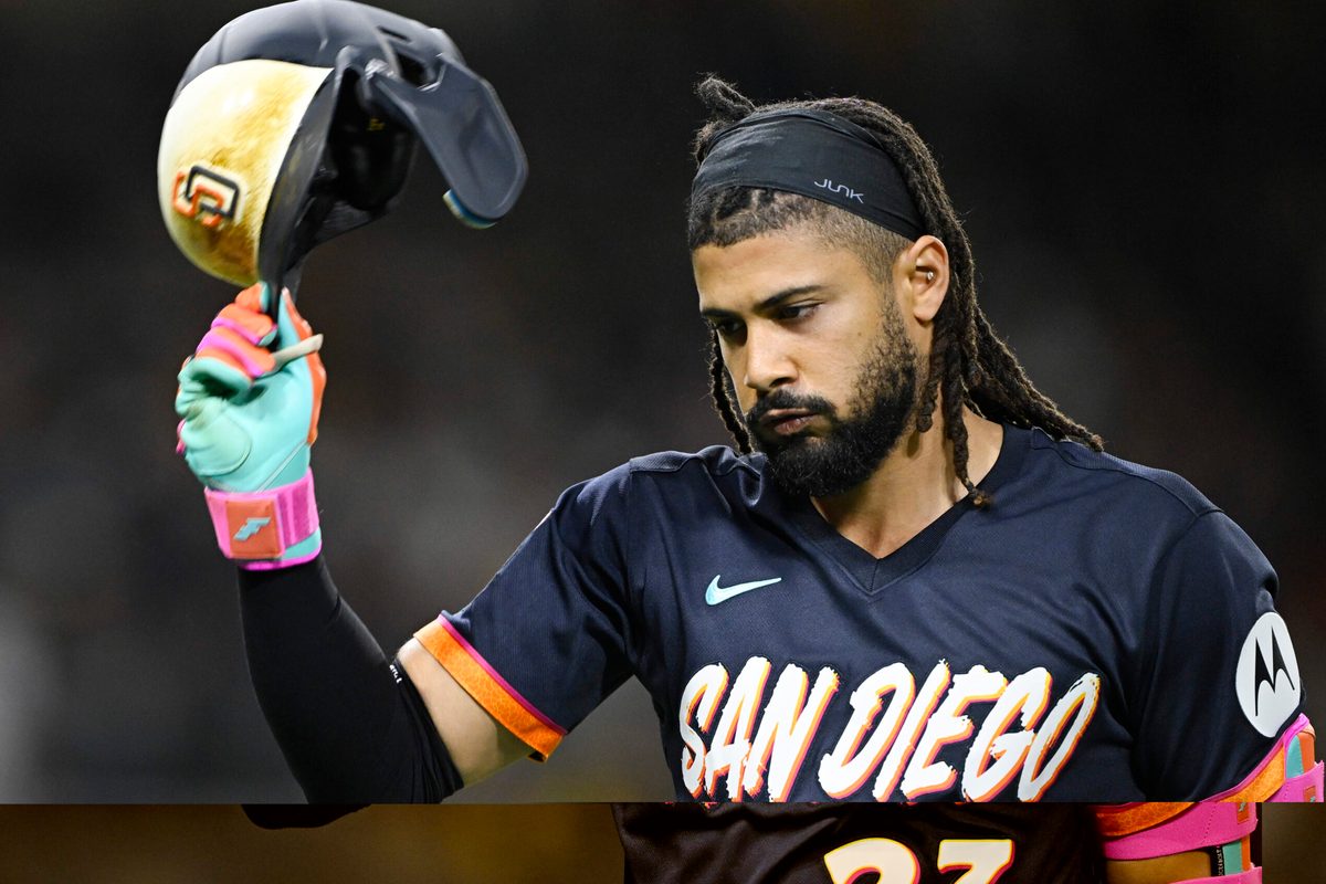 Jun 5, 2026; San Diego, California, USA; San Diego Padres right fielder Fernando Tatis Jr. (23) throws his helmet after lining out during the eighth inning against the New York Mets at Petco Park. Mandatory Credit: Denis Poroy-Imagn Images