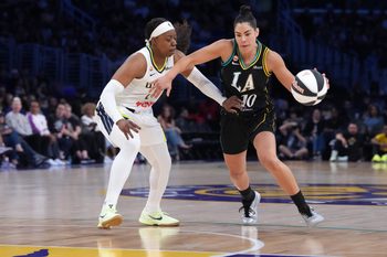 Jun 5, 2026; Los Angeles, CA, USA; LA Sparks guard Kelsey Plum (10) dribbles the ball against Dallas Wings guard Arike Ogunbowale (24) in the first half at Crypto.com Arena.  Mandatory Credit: Kirby Lee-Imagn Images
