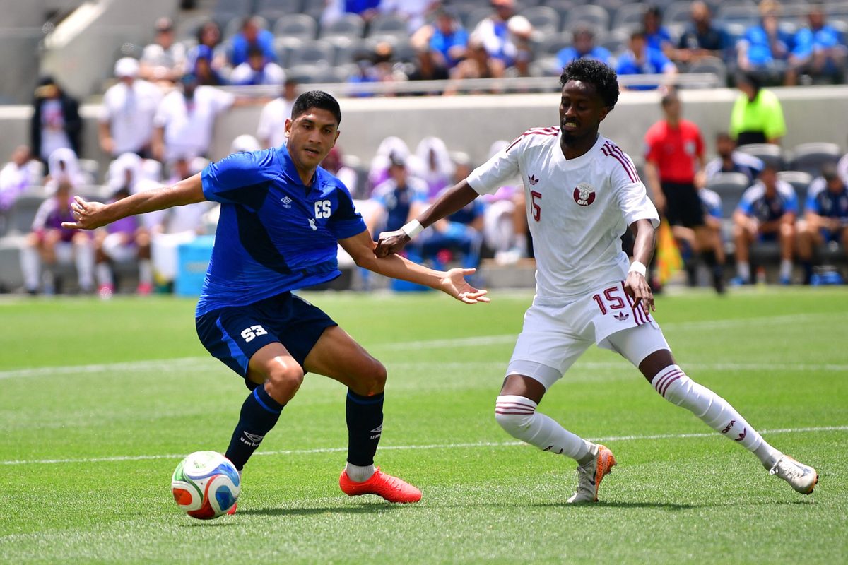 June 6, 2026; Los Angeles, California, U.S.; El Salvador's Christian Martinez in action with Qatar's Yusuf Abdurisag.  Mandatory Credit: Gary Vasquez-Imagn Images