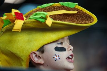 Jun 6, 2026; Houston, Texas, USA;  William Whitley , age 7 from Houston watches the Athletics bat against the Houston Astros in the seventh inning at Daikin Park. Mandatory Credit: Thomas Shea-Imagn Images