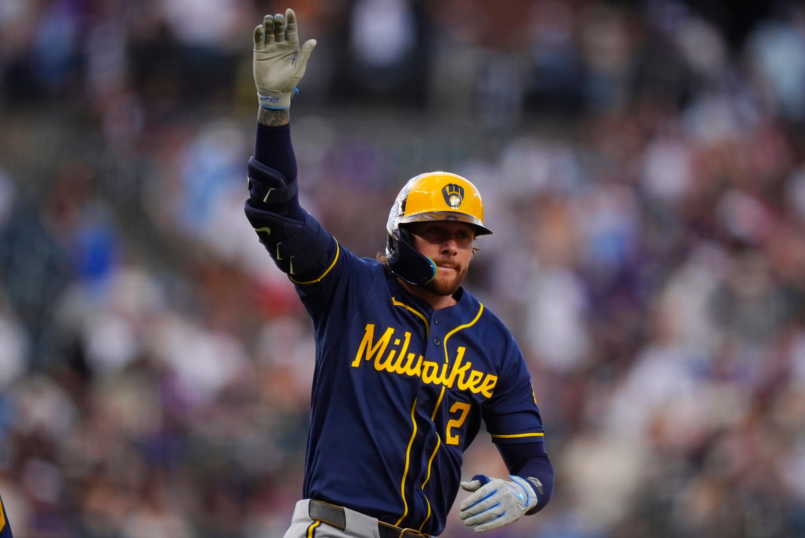 Jun 6, 2026; Denver, Colorado, USA;  Milwaukee Brewers second baseman Brice Turang (2) celebrates his solo home run in the first inning against the Colorado Rockies at Coors Field. Mandatory Credit: Ron Chenoy-Imagn Images