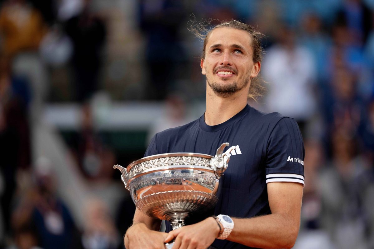 Jun 7, 2026; Paris, France; Alexander Zverev of Germany poses with the trophy after winning the mens singles final against Flavio Cobolli of Italy on day 15 at Stade Roland Garros. Mandatory Credit: Susan Mullane-Imagn Images