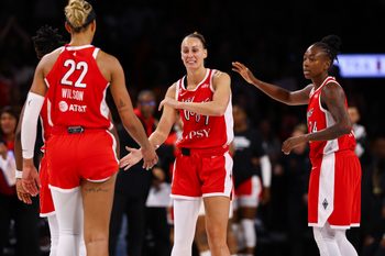 /Jun 6, 2026; Las Vegas, Nevada, USA; Las Vegas Aces forward Stephanie Talbot (7) celebrates the victory with Las Vegas Aces center A'ja Wilson (22) and Las Vegas Aces guard Jewell Loyd (24) against the Golden State Valkyries at Michelob Ultra Arena. Mandatory Credit: Boz Bloom-Imagn Images