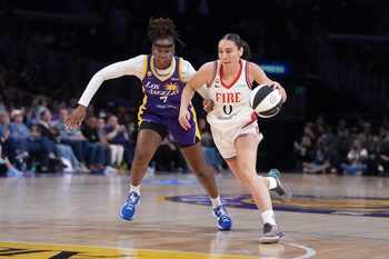 Jun 7, 2026; Los Angeles, California, USA; Portland Fire guard Carla Leite (0) drives to the basket against LA Sparks guard Ariel Atkins (7) in the first half at Crypto.com Arena. Mandatory Credit: Kirby Lee-Imagn Images