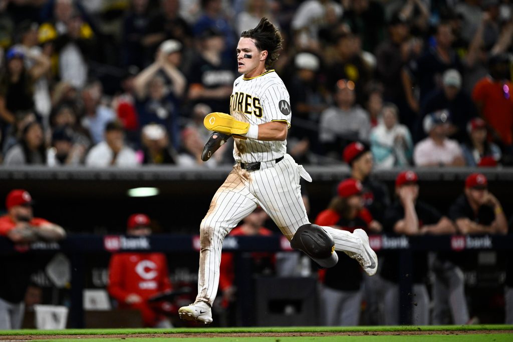 Jun 8, 2026; San Diego, California, USA; San Diego Padres center fielder Jase Bowen (4) runs as he scores during the eighth inning against the Cincinnati Reds at Petco Park. Mandatory Credit: Denis Poroy-Imagn Images