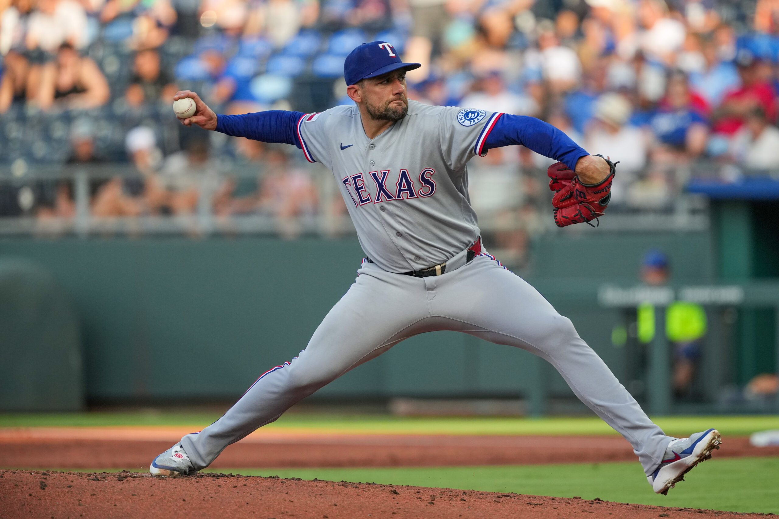 Jun 9, 2026; Kansas City, Missouri, USA; Texas Rangers starting pitcher Nathan Eovaldi (17) delivers a pitch against the Kansas City Royals during the first inning at Kauffman Stadium. Mandatory Credit: Denny Medley-Imagn Images
