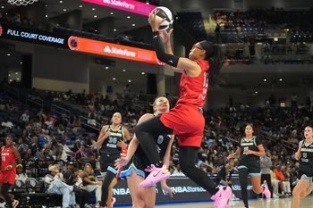 Jun 9, 2026; Chicago, Illinois, USA; Chicago Sky guard Jacy Sheldon (0) defends Atlanta Dream guard Allisha Gray (15) during the second half at Wintrust Arena. Mandatory Credit: David Banks-Imagn Images