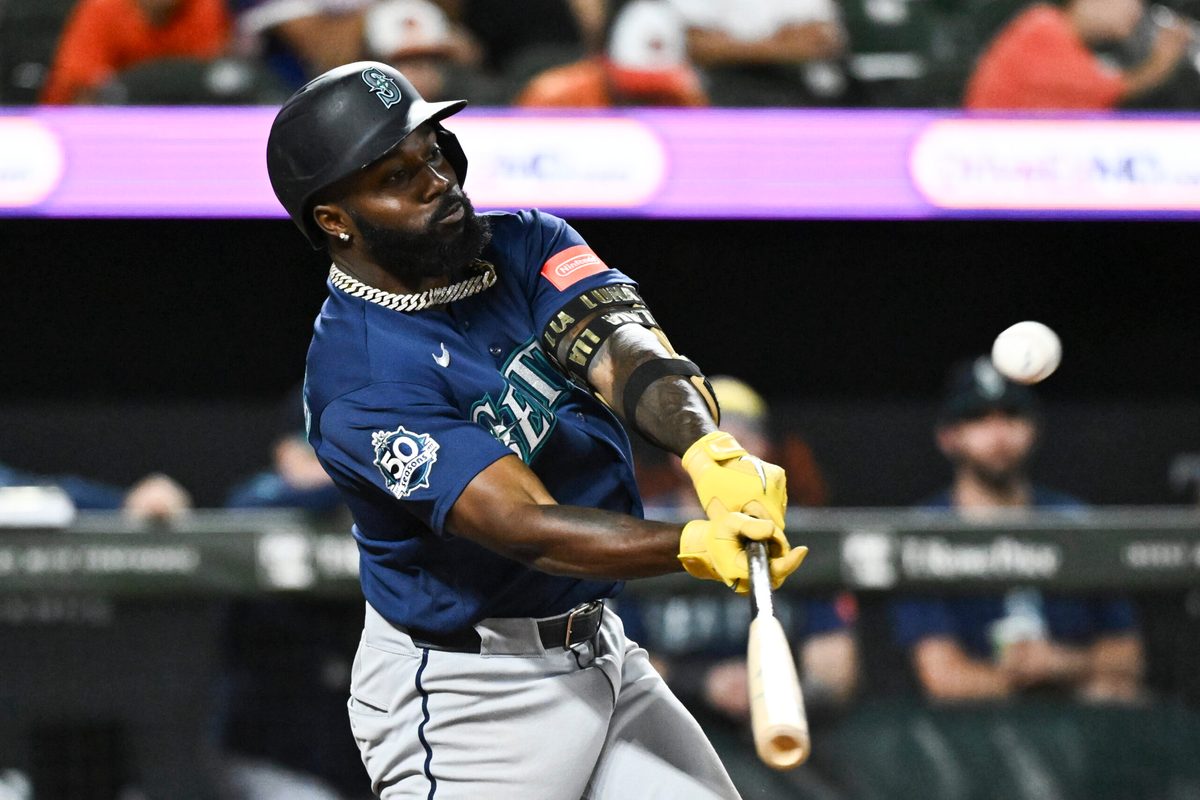 Jun 9, 2026; Baltimore, Maryland, USA;  Seattle Mariners left fielder Randy Arozarena (56) hits a two run home run during the tenth inning against the Baltimore Orioles at Oriole Park at Camden Yards. Mandatory Credit: James A. Pittman-Imagn Images