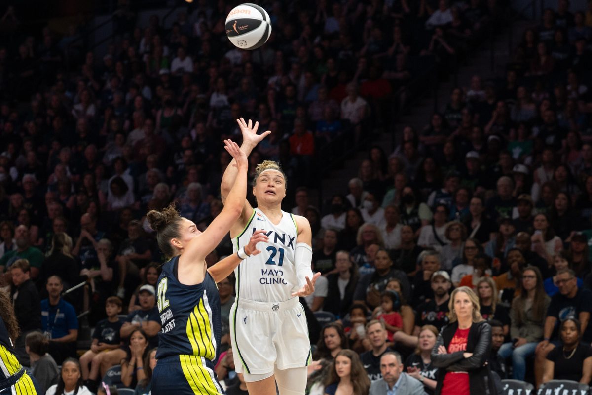 Jun 9, 2026; Minneapolis, Minnesota, USA; Minnesota Lynx guard Kayla McBride (21) shoots a floater over Dallas Wings forward Jessica Shepard (32) in the third quarter at Target Center. Mandatory Credit: Matt Blewett-Imagn Images