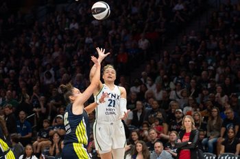 Jun 9, 2026; Minneapolis, Minnesota, USA; Minnesota Lynx guard Kayla McBride (21) shoots a floater over Dallas Wings forward Jessica Shepard (32) in the third quarter at Target Center. Mandatory Credit: Matt Blewett-Imagn Images