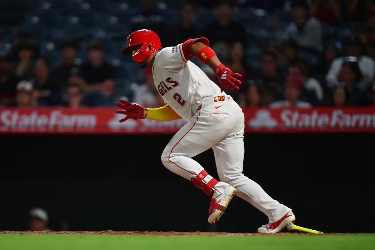 Jun 9, 2026; Anaheim, California, USA; Los Angeles Angels second baseman Oswald Peraza (2) runs after hitting an RBI single against the Houston Astros during the eighth inning at Angel Stadium. Mandatory Credit: Gary A. Vasquez-Imagn Images