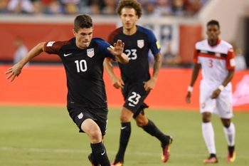 United States midfielder Christian Pulisic (10) moves the ball down the field during early game action against Trinidad & Tobago on September 6, 2016 in a semifinal CONCACAF World Cup qualifier at EverBank Field in Jacksonville, Florida. [Bob Self/Florida Times-Union]