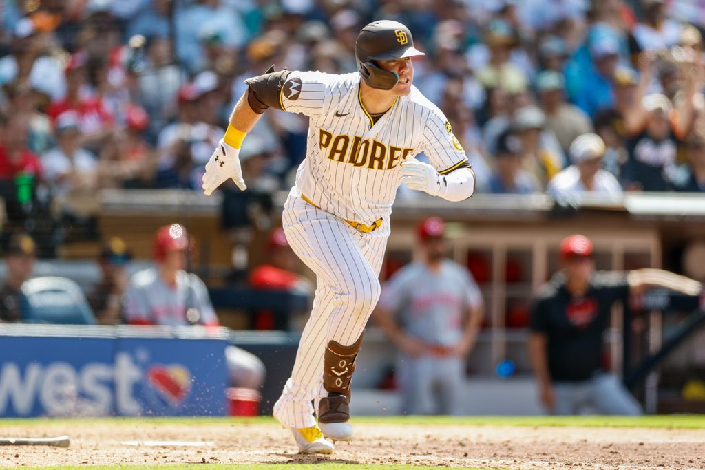 Jun 10, 2026; San Diego, California, USA; San Diego Padres left fielder Gavin Sheets (30) hits an RBI double during the eighth inning against the Cincinnati Reds at Petco Park. Mandatory Credit: David Frerker-Imagn Images