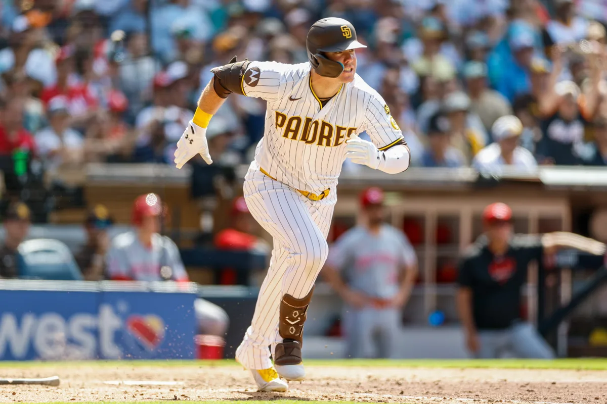 Jun 10, 2026; San Diego, California, USA; San Diego Padres left fielder Gavin Sheets (30) hits an RBI double during the eighth inning against the Cincinnati Reds at Petco Park. Mandatory Credit: David Frerker-Imagn Images