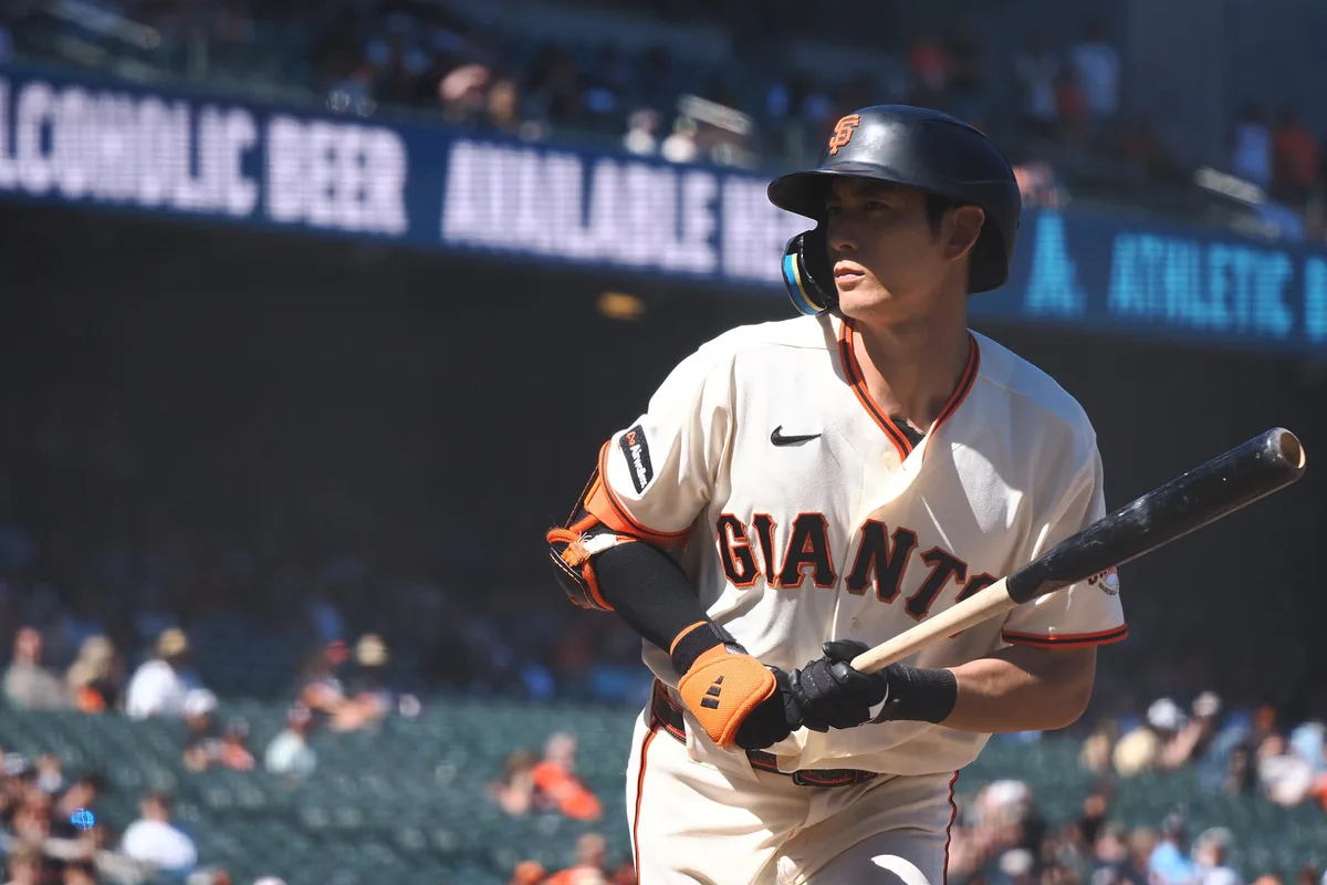 Jun 10, 2026; San Francisco, California, USA; San Francisco Giants right fielder Jung Hoo Lee (51) avoids being hit by the ball on a pitch by the Washington Nationals during the ninth inning at Oracle Park. Mandatory Credit: Kelley L Cox-Imagn Images