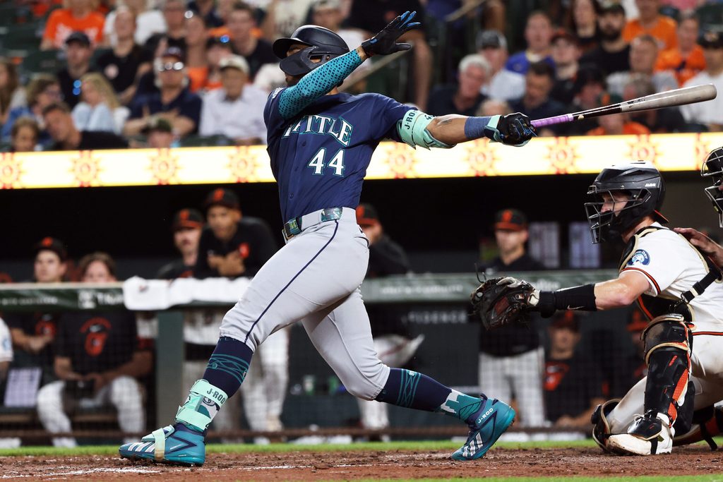 Jun 10, 2026; Baltimore, Maryland, USA; Seattle Mariners center fielder Julio Rodriguez (44) drives in a run during the eighth inning against the Baltimore Orioles at Oriole Park at Camden Yards. Mandatory Credit: Daniel Kucin Jr.-Imagn Images