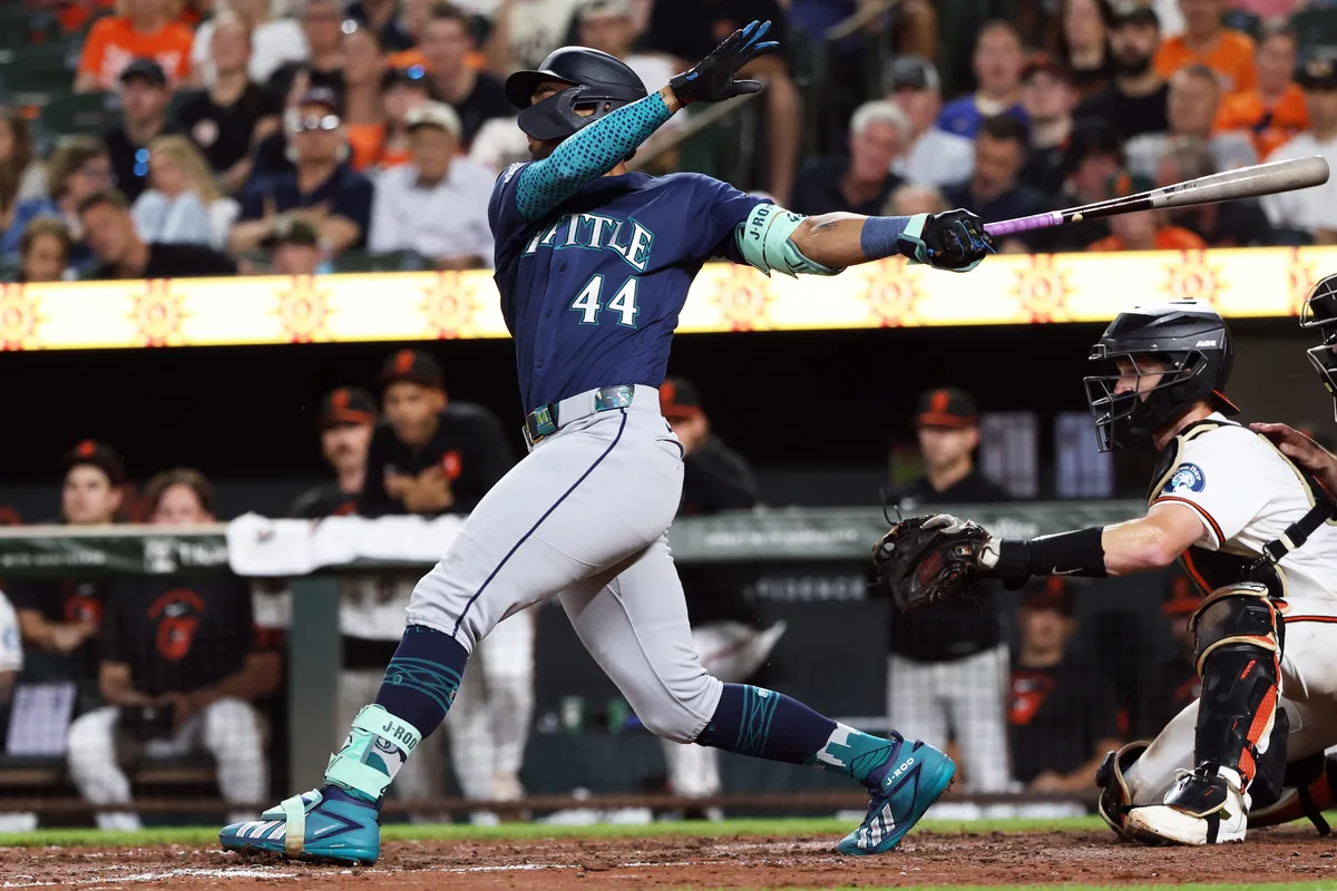 Jun 10, 2026; Baltimore, Maryland, USA; Seattle Mariners center fielder Julio Rodriguez (44) drives in a run during the eighth inning against the Baltimore Orioles at Oriole Park at Camden Yards. Mandatory Credit: Daniel Kucin Jr.-Imagn Images