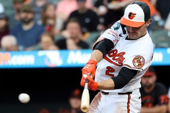 Jun 10, 2026; Baltimore, Maryland, USA; Baltimore Orioles shortstop Gunnar Henderson (2) hits a single during the third inning against the Seattle Mariners at Oriole Park at Camden Yards. Mandatory Credit: Daniel Kucin Jr.-Imagn Images