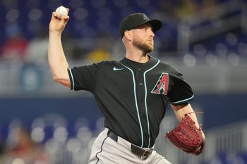 Jun 11, 2026; Miami, Florida, USA;  Arizona Diamondbacks pitcher Merrill Kelly (29) throws in the first inning against the Miami Marlins at loanDepot Park. Mandatory Credit: Jim Rassol-Imagn Images