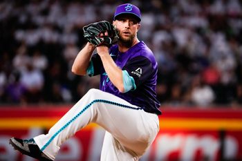 Jun 5, 2026; Phoenix, Arizona, USA;  Arizona Diamondbacks pitcher Merrill Kelly (29) throws against the against the Washington Nationals at Chase Field. Mandatory Credit: Arianna Grainey-Imagn Images