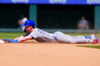 Jun 11, 2026; Denver, Colorado, USA;  Chicago Cubs center fielder Pete Crow-Armstrong (4) slides into second base in the seventh inning against the Colorado Rockies at Coors Field. Mandatory Credit: Ron Chenoy-Imagn Images