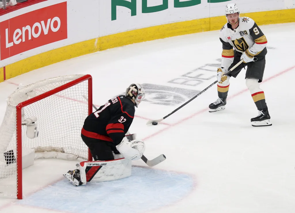 Jun 11, 2026; Raleigh, North Carolina, USA; Vegas Golden Knights center Jack Eichel (9) looks to pass against Carolina Hurricanes goaltender Brandon Bussi (32) during the first period in game five of the 2026 Stanley Cup Final at Lenovo Center. Mandatory Credit: Nathan Ray Seebeck-Imagn Images