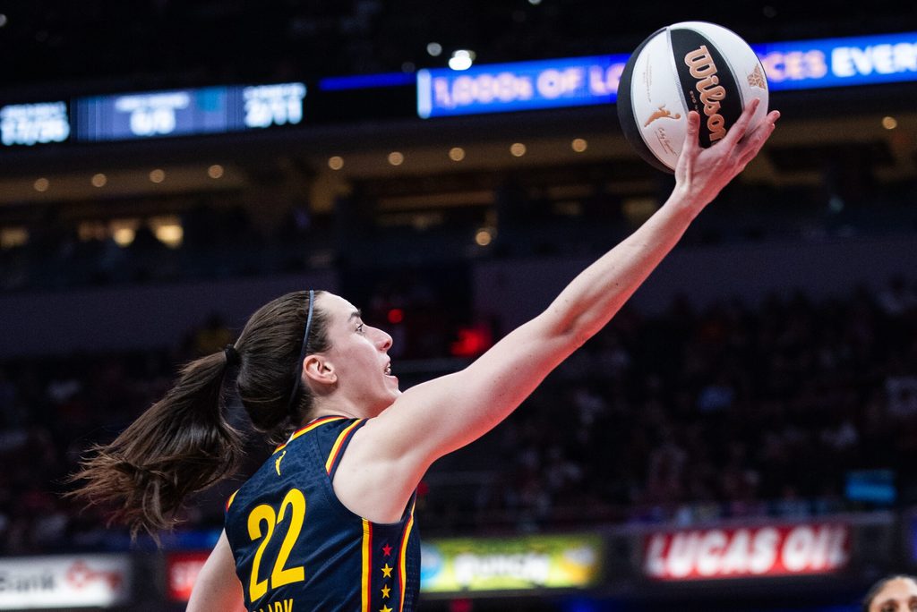 Jun 11, 2026; Indianapolis, Indiana, USA; Indiana Fever guard Caitlin Clark (22) shoots the ball in the second half against the Chicago Sky at Gainbridge Fieldhouse. Mandatory Credit: Trevor Ruszkowski-Imagn Images