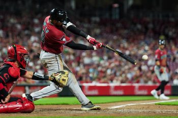 Jun 12, 2026; Cincinnati, Ohio, USA;  Arizona Diamondbacks outfielder Jordan Lawlar (10) breaks his bat as he hits a two-run single against the Cincinnati Reds in the ninth inning at Great American Ball Park. Mandatory Credit: Aaron Doster-Imagn Images