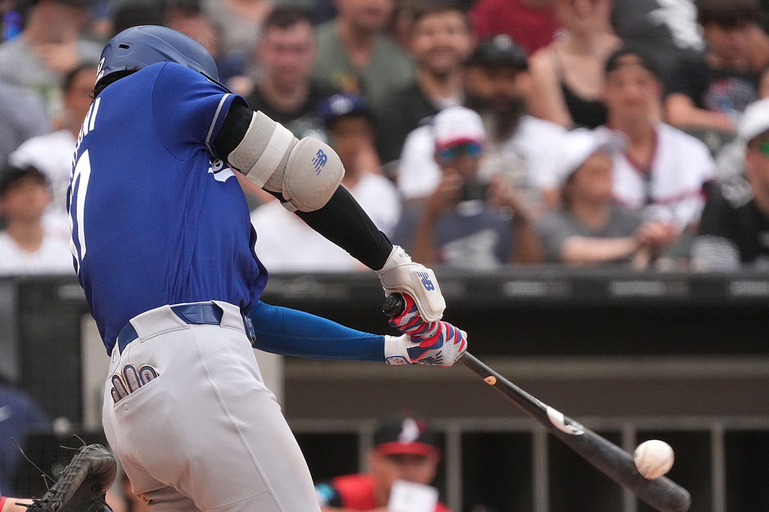 Jun 13, 2026; Chicago, Illinois, USA; Los Angeles Dodgers two-way player Shohei Ohtani (17) hits a long fly out against the Chicago White Sox during the eighth inning at Rate Field. Mandatory Credit: David Banks-Imagn Images