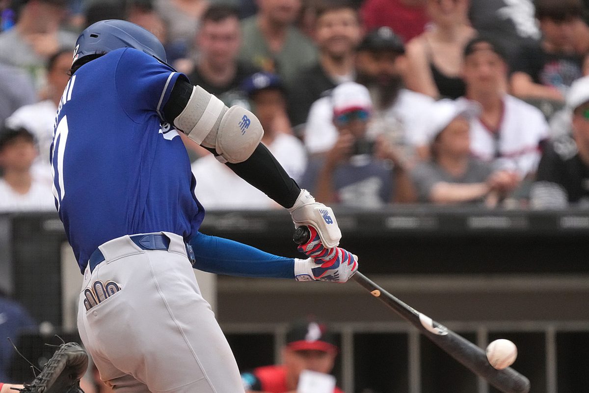 Jun 13, 2026; Chicago, Illinois, USA; Los Angeles Dodgers two-way player Shohei Ohtani (17) hits a long fly out against the Chicago White Sox during the eighth inning at Rate Field. Mandatory Credit: David Banks-Imagn Images