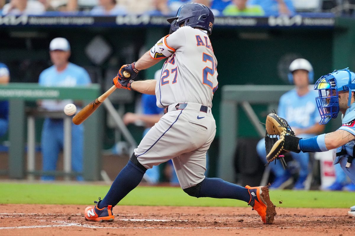 Jun 13, 2026; Kansas City, Missouri, USA; Houston Astros second baseman Jose Altuve (27) hits a single against the Kansas City Royals during the fourth inning at Kauffman Stadium. Mandatory Credit: Denny Medley-Imagn Images