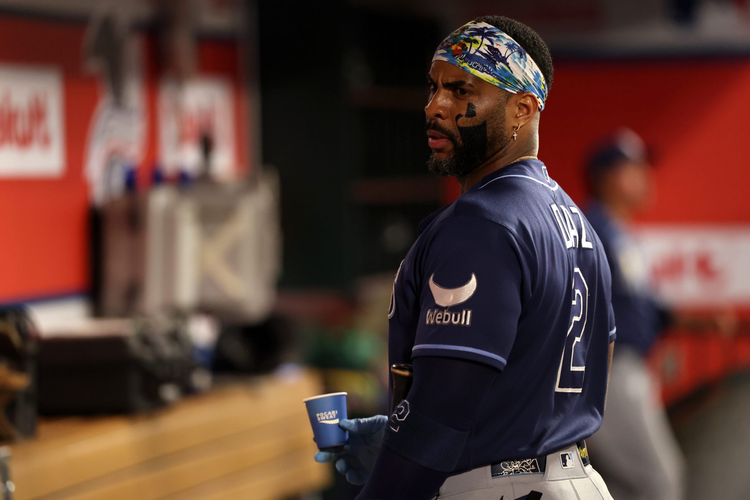 Jun 13, 2026; Anaheim, California, USA;  Tampa Bay Rays designated hitter Yandy Diaz (2) looks on in the dugout during the sixth inning against the Los Angeles Angels at Angel Stadium. Mandatory Credit: Kiyoshi Mio-Imagn Images