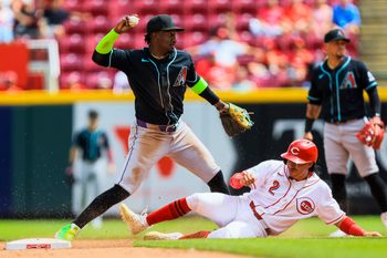 Jun 14, 2026; Cincinnati, Ohio, USA; Arizona Diamondbacks shortstop Geraldo Perdomo (2) throws to first to get Cincinnati Reds outfielder Blake Dunn (not pictured) out to complete the double play in the seventh inning at Great American Ball Park. Mandatory Credit: Katie Stratman-Imagn Images