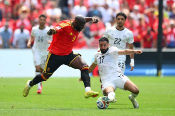 June 15, 2026; Seattle, Washington, U.S.; Belgium's Romelu Lukaku in action with Egypt's Mohanad Lashin.  Mandatory Credit: Steven Bisig-Imagn Images