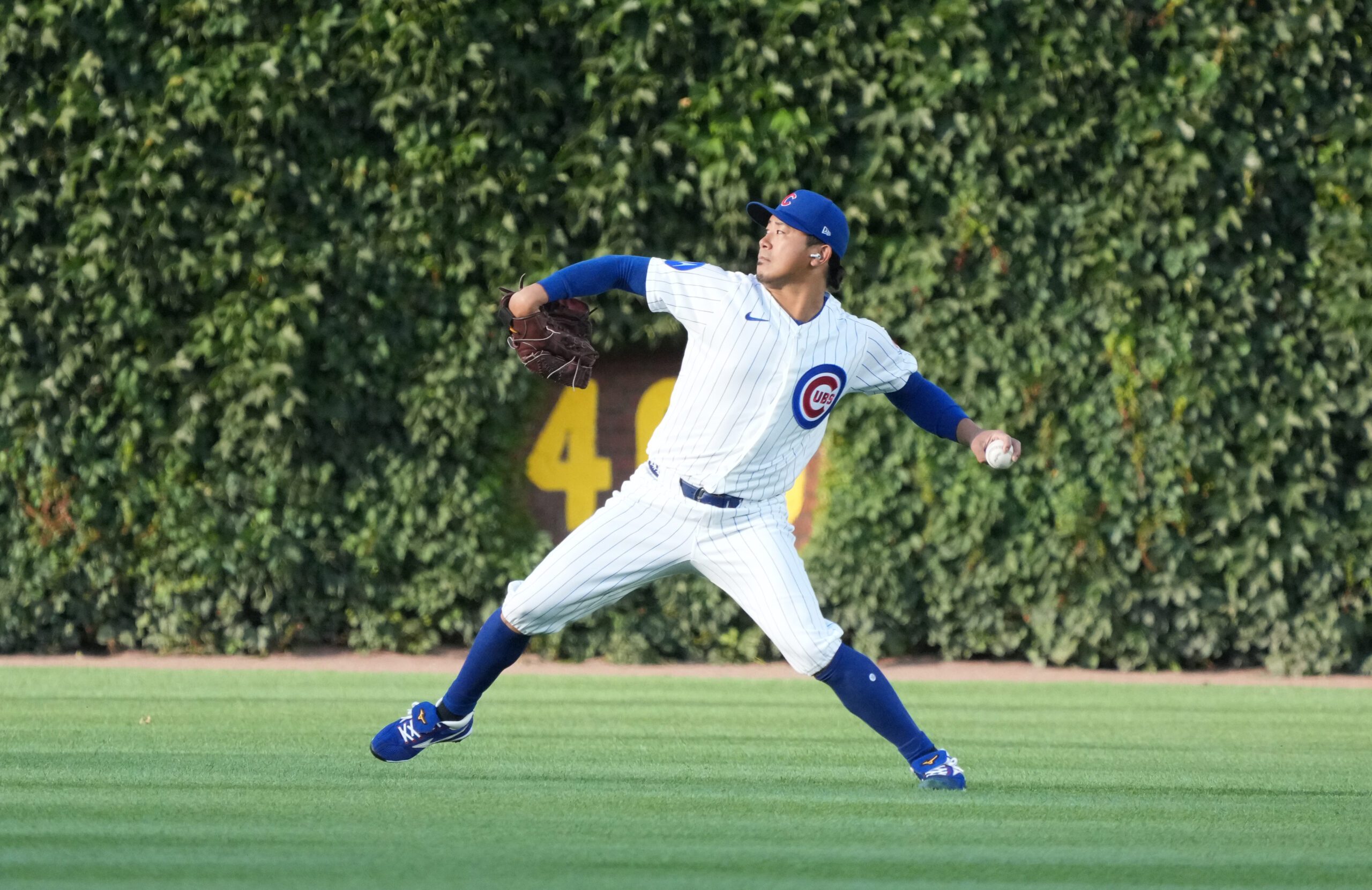 Jun 15, 2026; Chicago, Illinois, USA; Chicago Cubs pitcher Shota Imanaga (18) warms up before the game against the Colorado Rockies at Wrigley Field. Mandatory Credit: David Banks-Imagn Images