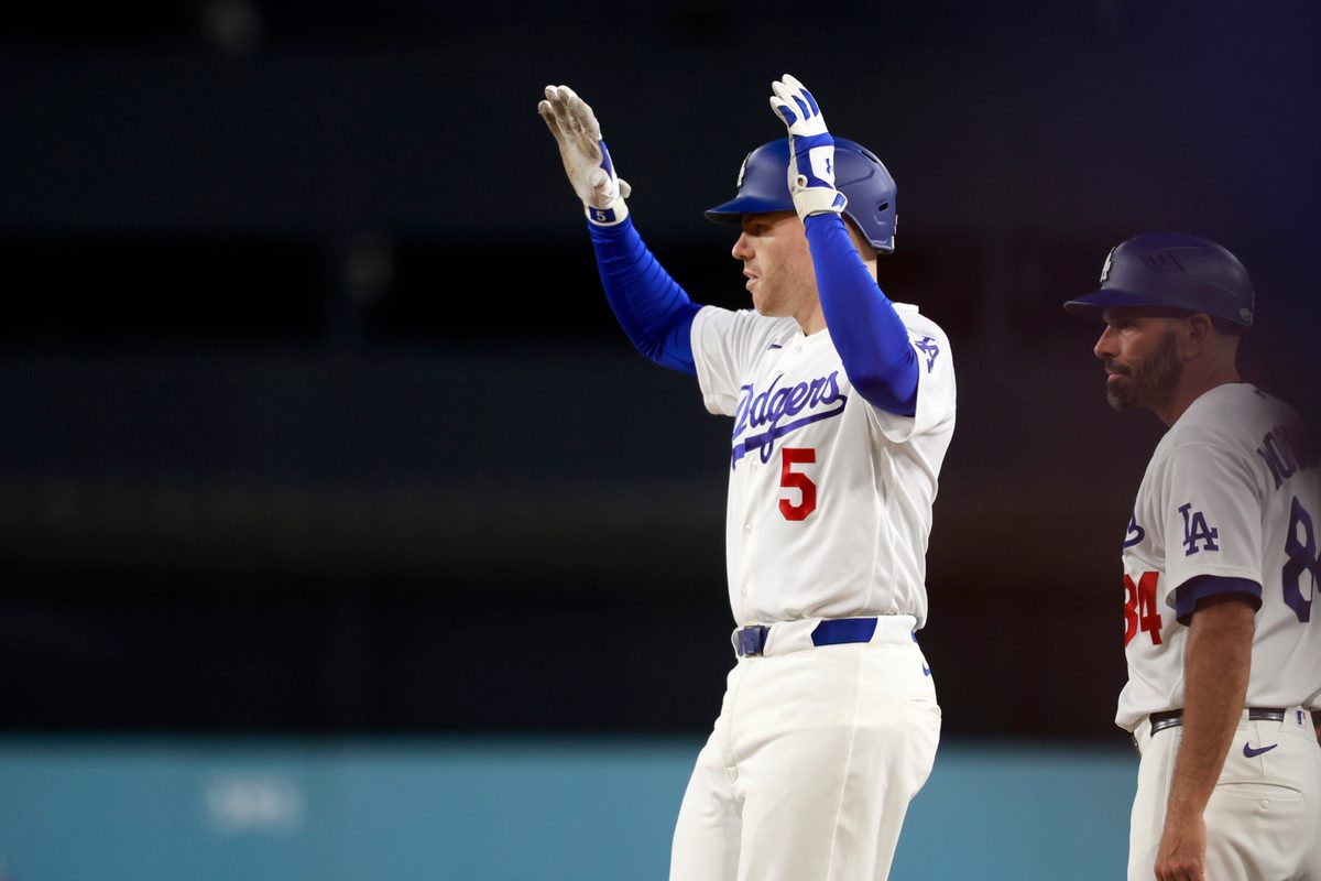 Jun 15, 2026; Los Angeles, California, USA; Los Angeles Dodgers first baseman Freddie Freeman (5) reacts after hitting a single in the eighth inning against the Tampa Bay Rays at Dodger Stadium. Mandatory Credit: William Navarro-Imagn Images