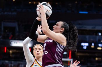 Jun 16, 2026; Indianapolis, Indiana, USA;  Toronto Tempo guard Marina Mabrey (3) shoots the ball while Indiana Fever guard Sophie Cunningham (8) defends in the first half at Gainbridge Fieldhouse. Mandatory Credit: Trevor Ruszkowski-Imagn Images